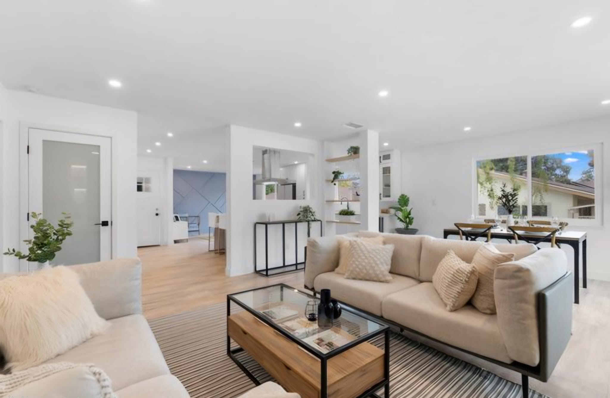 Freshly painted open-plan living space, new build